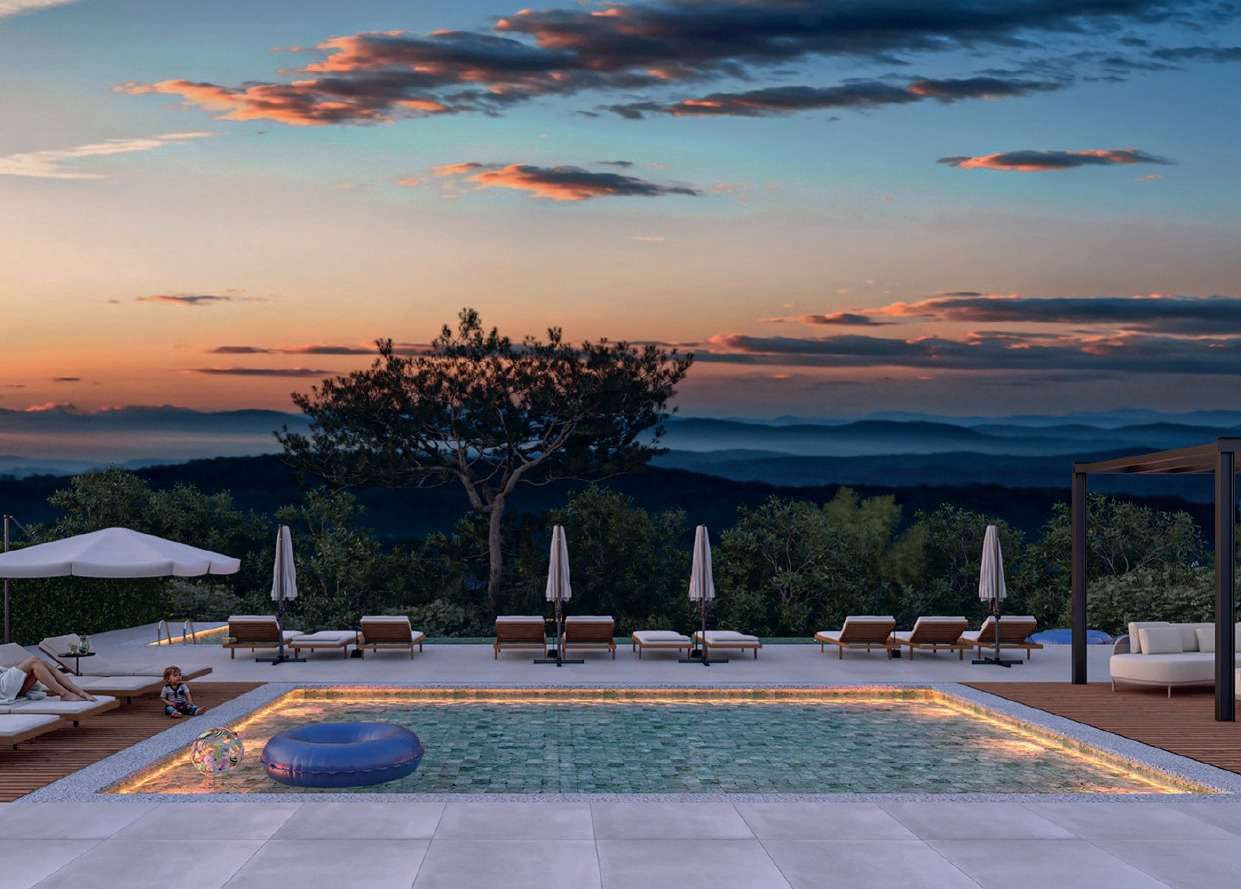 Piscinas e área de lazer do Forest Houses ao entardecer